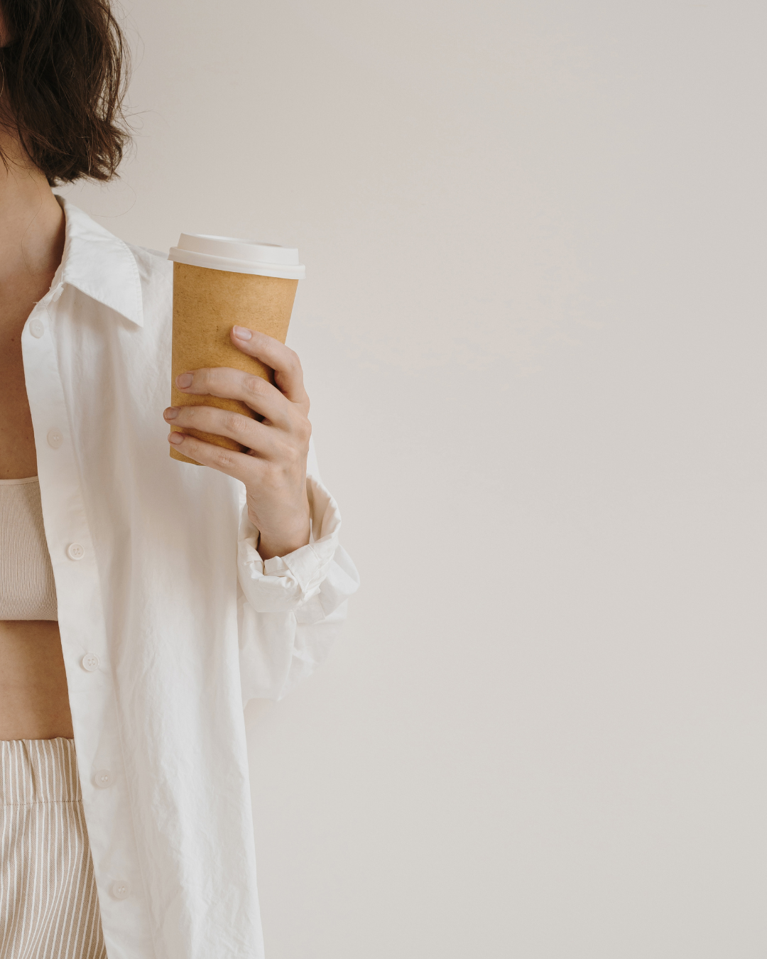 Relaxed woman holding a coffee cup